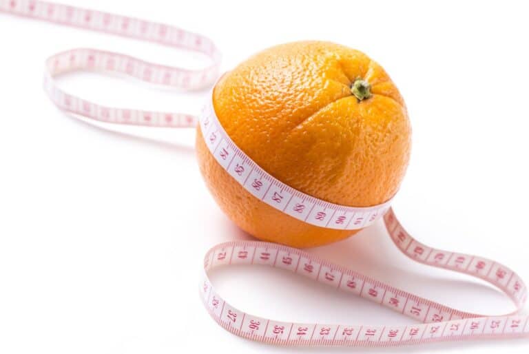 Orange with tape measure - losing weight