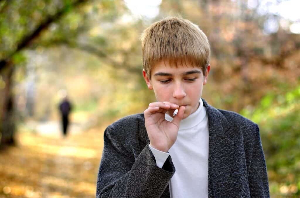 A teenager smoking