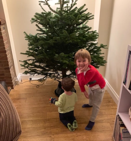 Children decorating the Christmas tree