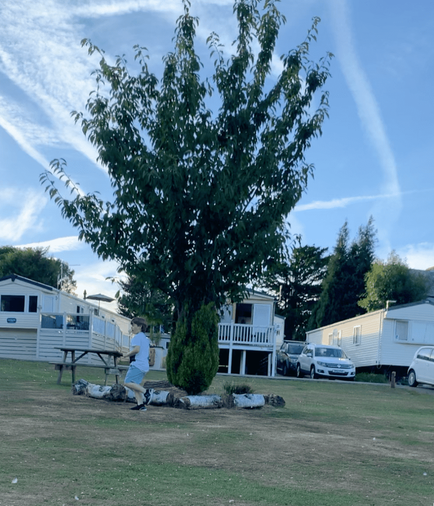 Child running around at Coghurst Hall Holiday Park near Hastings